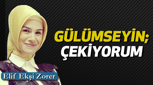 Gülümseyin; Çekiyorum
